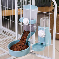 Transparent automatic pet feeder with white base being refilled